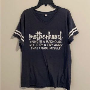 Motherhood defined tee